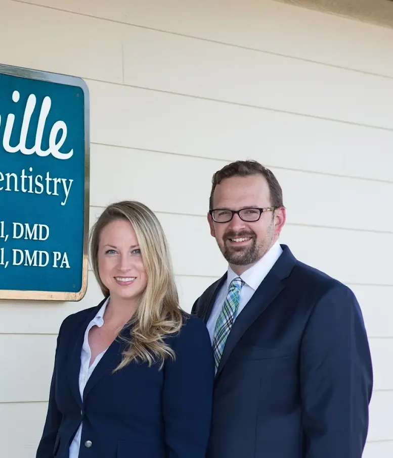 Dr. Jill Merrell and Dr. David Merrell outside the Weaverville Family Dentistry office
